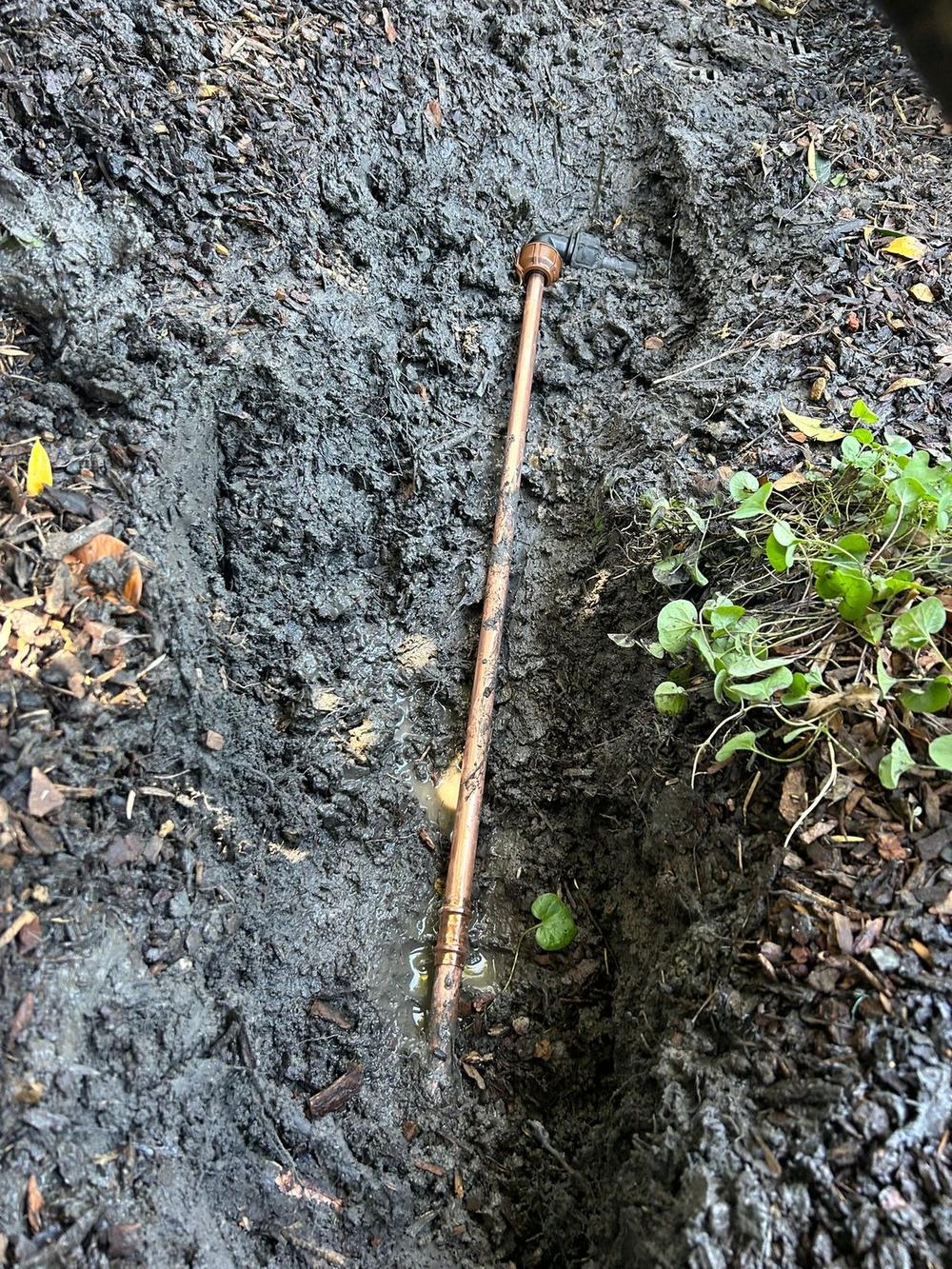 Underground copper water main replacement Kew